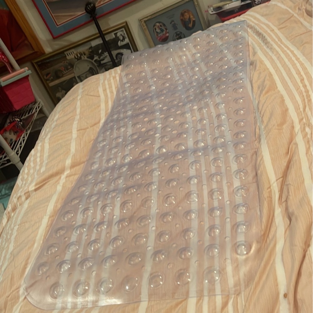 Bath mat that you put inside the bathtub new open box never used
